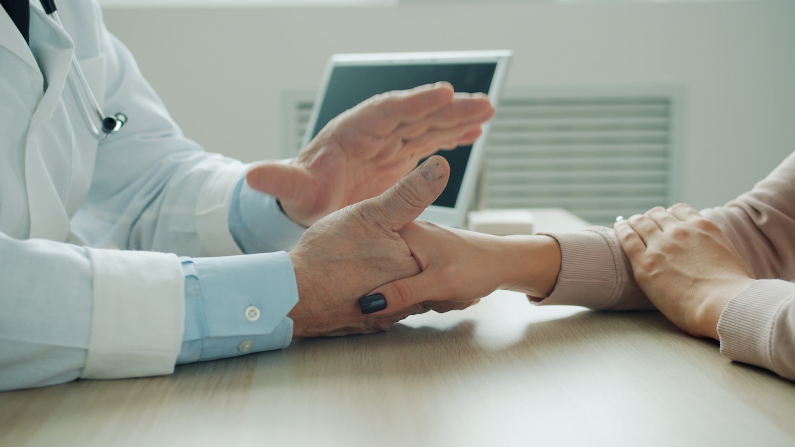 Michigan physician consulting with a patient, supported by Medical Management Systems billing and credentialing services